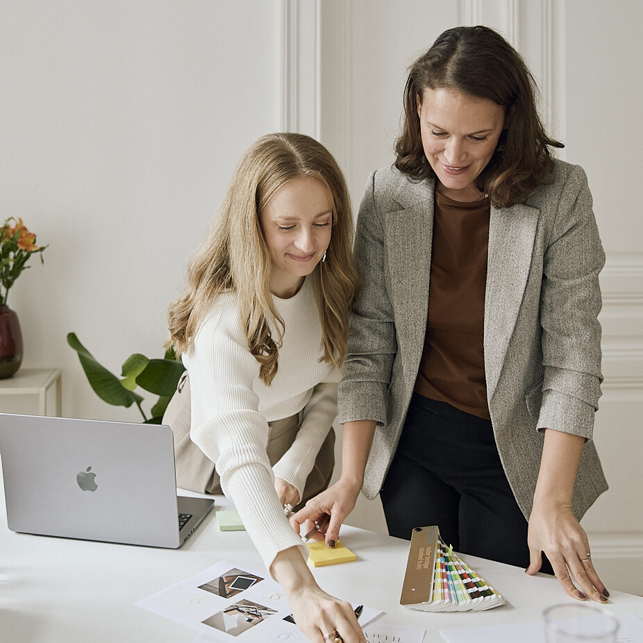Glasswing Collective team collaborating on a branding project, refining creative concepts.
